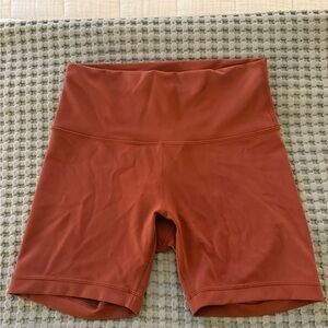 lululemon athletica biker shorts in Rust size 8